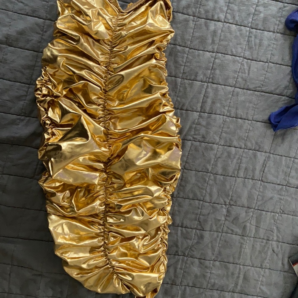 Gold metallic dress. Size small. Never worn